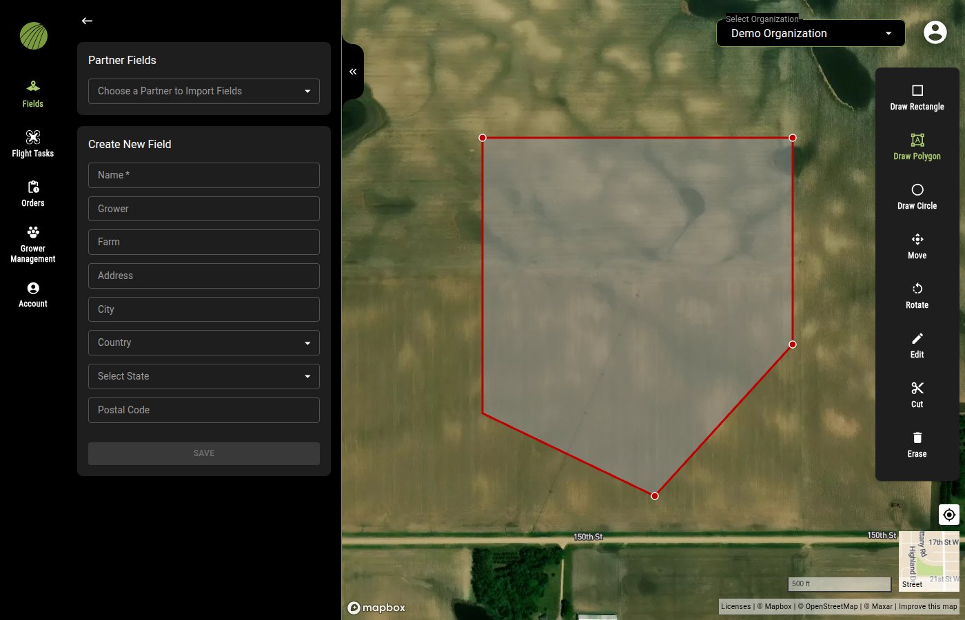A polygon being drawn with Draw Polygon: four placed corners with a red outline and a white fill over a field