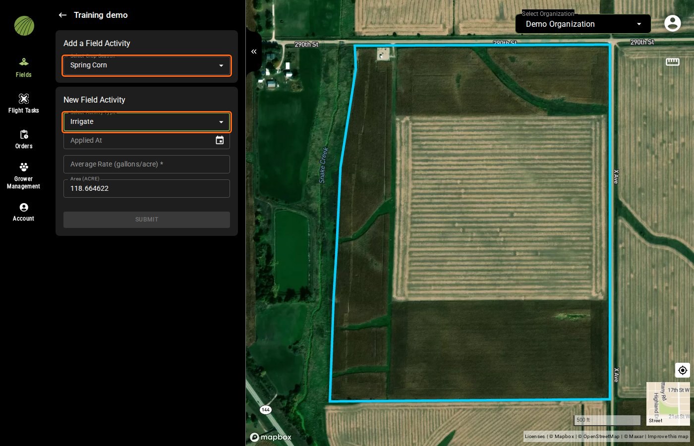 Add a Field Activity with Select Crop Season set to Spring Corn and Select Activity Type set to Irrigate, both outlined, and the Irrigate details Applied At, Average Rate (gallons/acre) and Area (ACRE) below